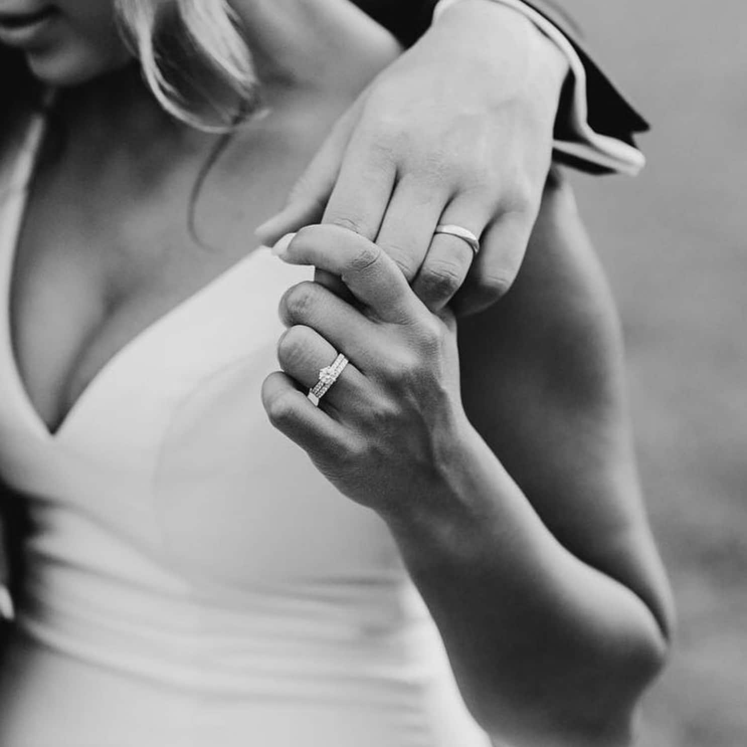 Groom kisses brides hand with engagement ring | Engagement ring hand  photos, Couple engagement pictures, Engagement ring photography