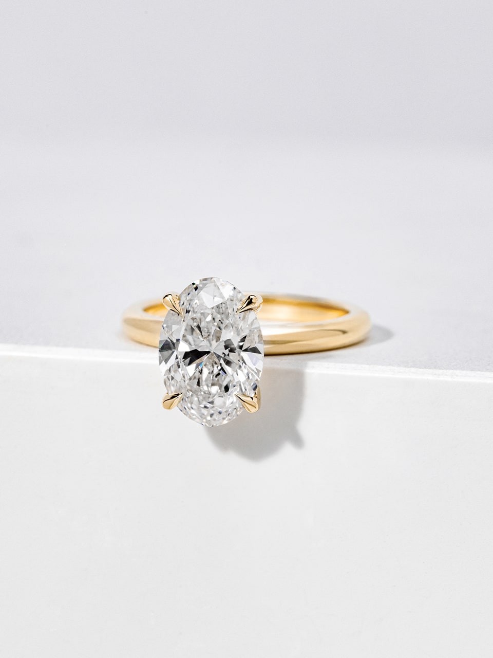 Oval Lab Grown Diamond Gold Engagement Ring with Hidden Halo