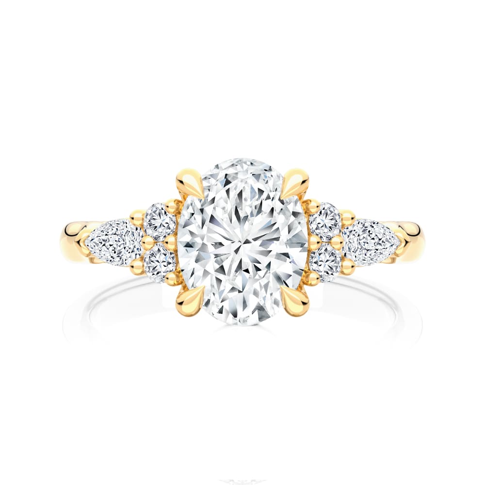 Cerulean Yellow Gold Engagement Ring with an Oval Diamond & Side Stones